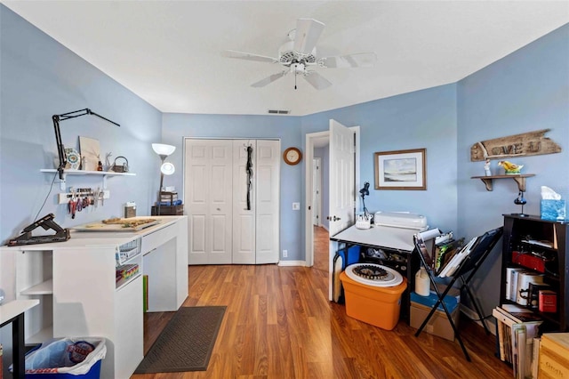 8231 Coral Creek Loop, Hudson, FL 34667 - kitchen with light wood-style floors, a ceiling fan, and open shelves