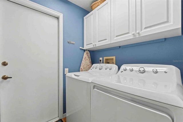 8231 Coral Creek Loop, Hudson, FL 34667 - laundry room featuring separate washer and dryer and cabinet space