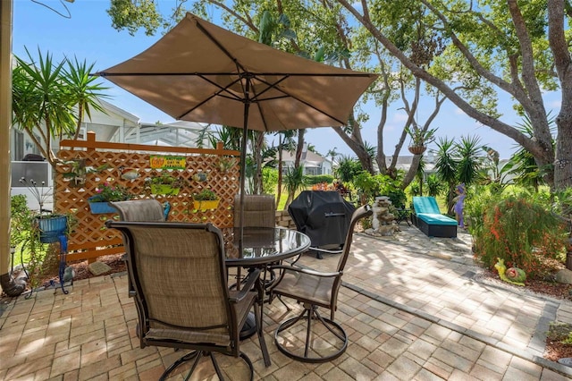 8231 Coral Creek Loop, Hudson, FL 34667 - view of patio featuring outdoor dining area