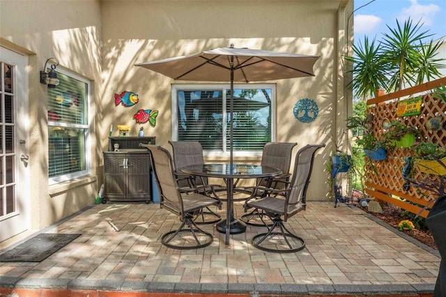 8231 Coral Creek Loop, Hudson, FL 34667 - view of patio / terrace featuring outdoor dining space