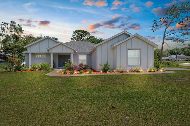 view of front of home featuring a yard