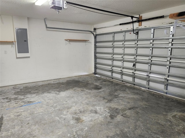 garage with electric panel and a garage door opener