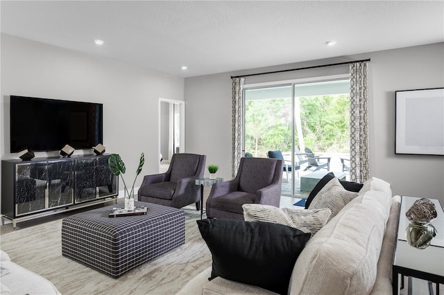 living room with a textured ceiling