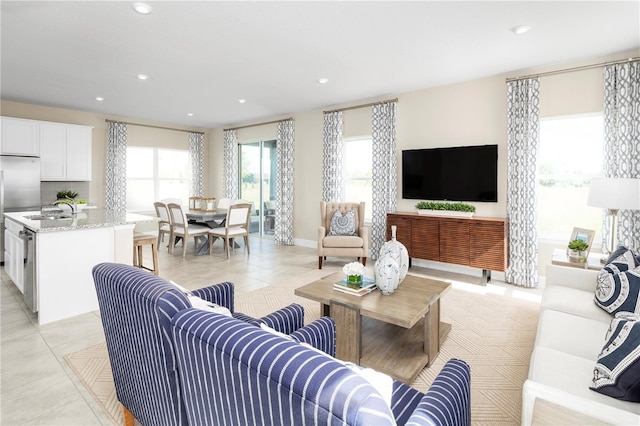 tiled living room featuring sink