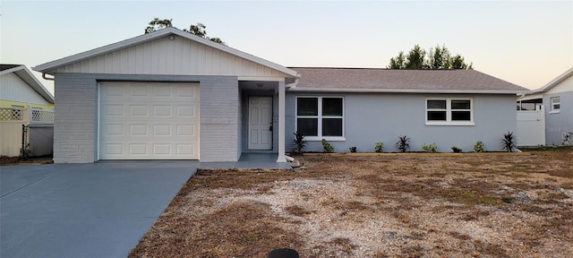 single story home with a garage