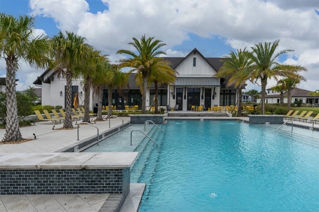 view of pool featuring a patio