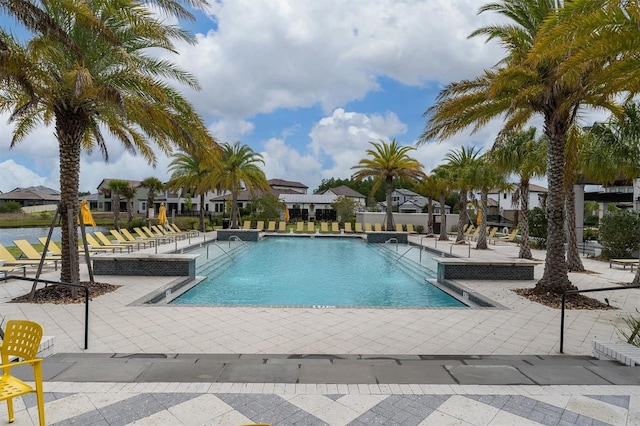 view of pool featuring a patio area