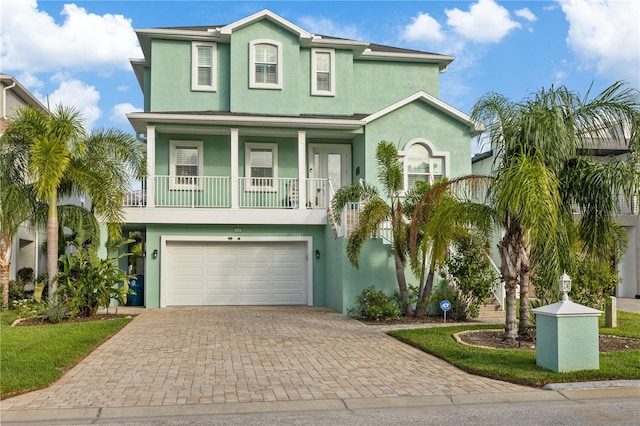 coastal inspired home featuring a garage