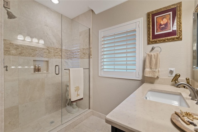 bathroom with vanity and walk in shower