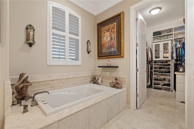 bathroom with tiled tub