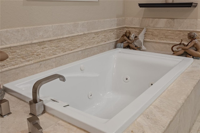 bathroom with tiled bath