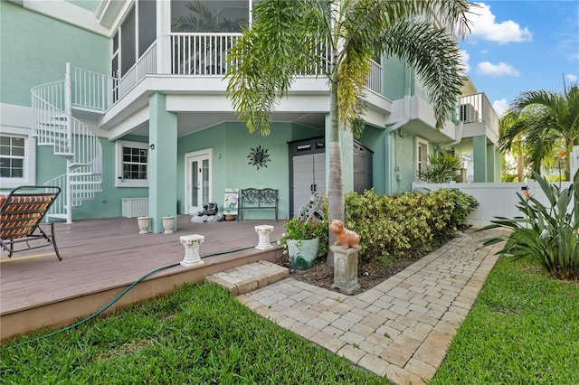 exterior space featuring a wooden deck