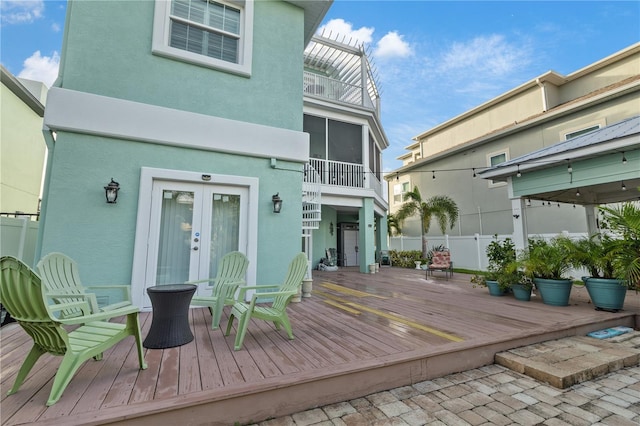 wooden deck featuring french doors