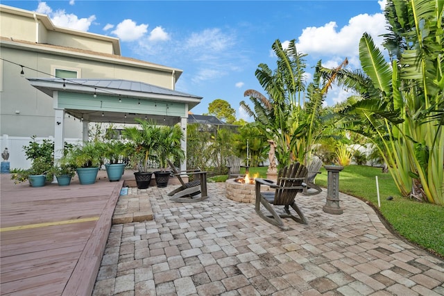 view of patio / terrace with a gazebo and an outdoor fire pit