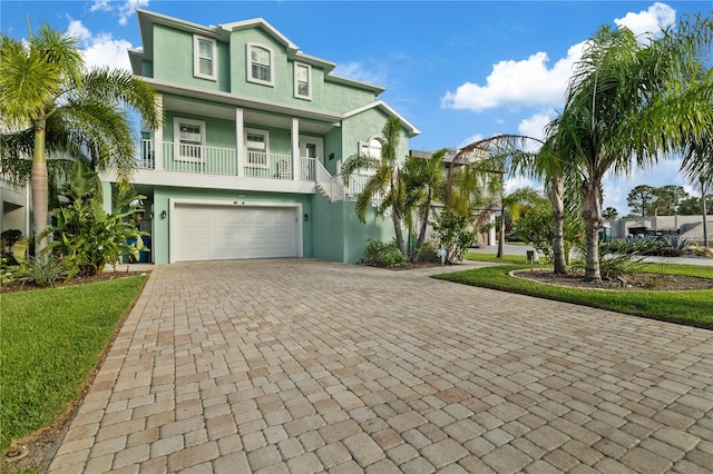 raised beach house with a garage