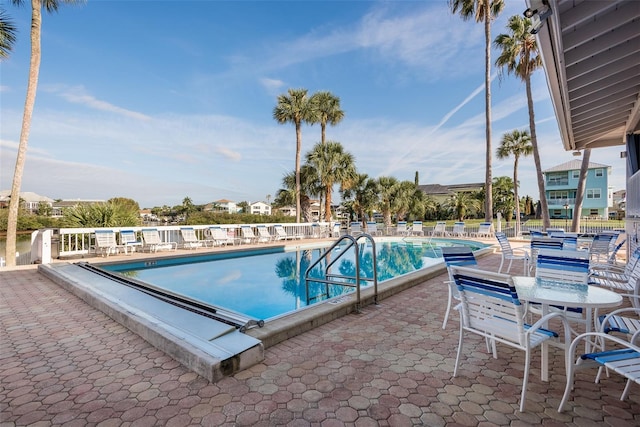 view of pool featuring a patio area