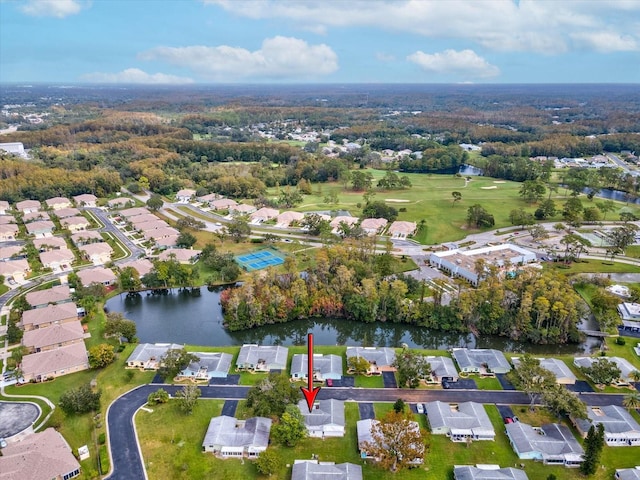 drone / aerial view with a water view