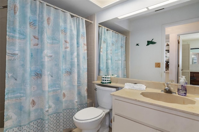 full bathroom featuring toilet, shower / tub combo, and vanity