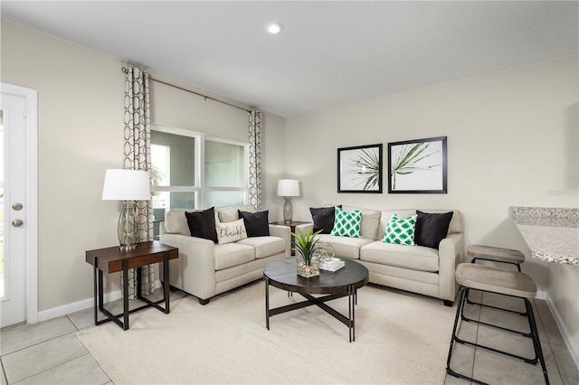 living room with light tile patterned flooring