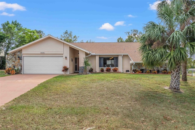 single story home with a garage and a front yard