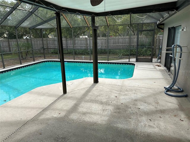 8353 Forest Oaks Blvd, Spring Hill, FL 34606 - view of pool featuring a lanai, a patio, and a fenced backyard
