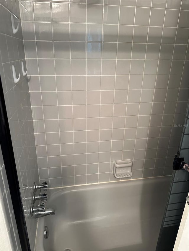 8353 Forest Oaks Blvd, Spring Hill, FL 34606 - bathroom with bathtub / shower combination