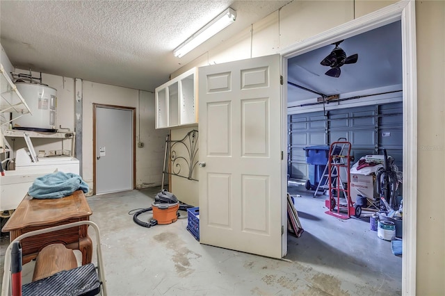 basement with water heater and a textured ceiling