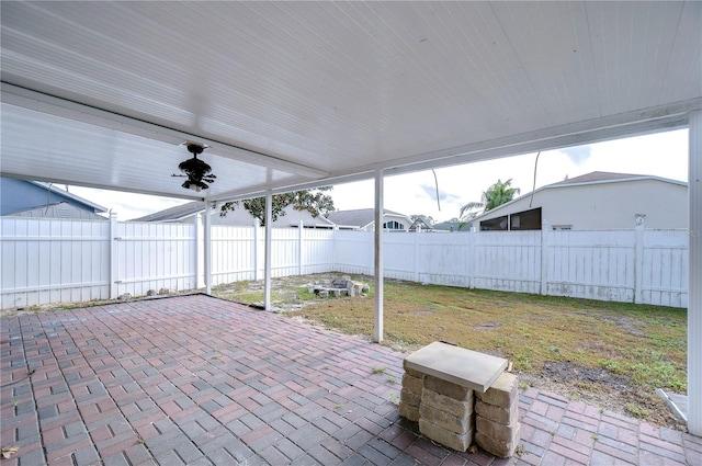 view of patio featuring ceiling fan