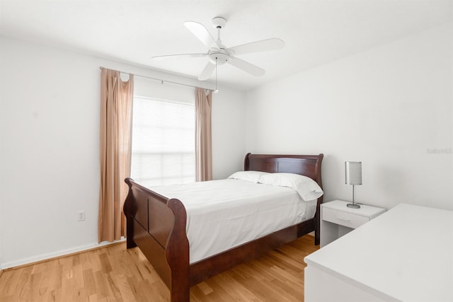 bedroom featuring light hardwood / wood-style flooring and ceiling fan