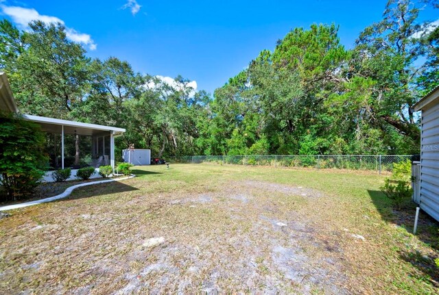 view of yard with a shed