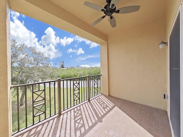 balcony featuring ceiling fan