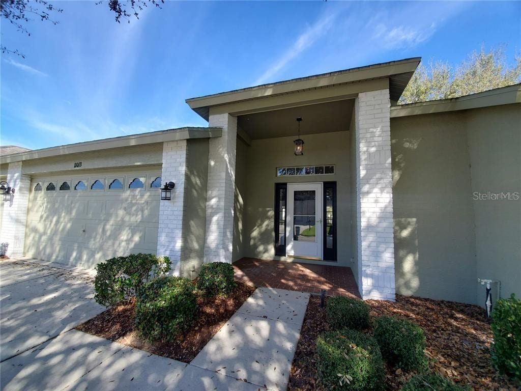 entrance to property featuring a garage