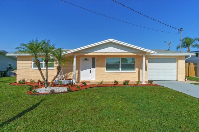 single story home featuring a garage and a front yard