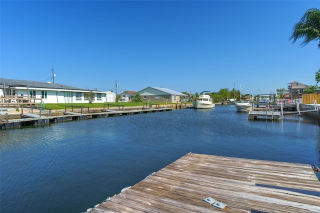 dock area featuring a water view