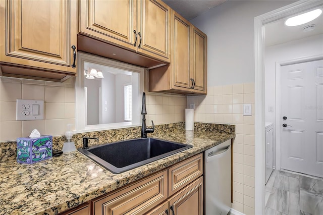 7499 Heather Walk, Weeki Wachee, FL 34613 - kitchen featuring dishwasher, a sink, light stone countertops, tile walls, and light marble finish flooring
