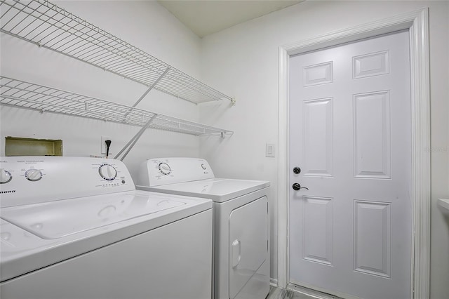 laundry room featuring washer and clothes dryer