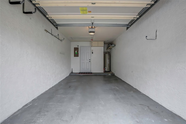 garage with electric water heater, electric panel, and a garage door opener