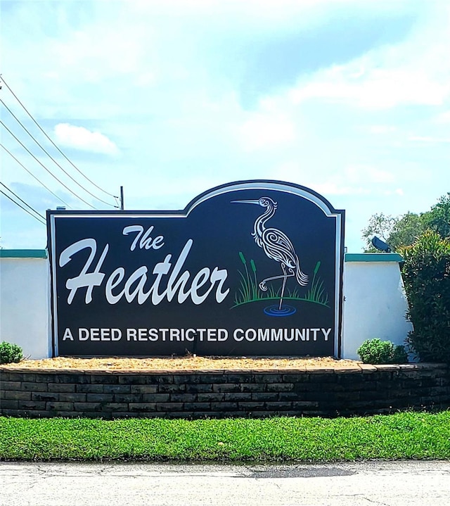 7499 Heather Walk, Weeki Wachee, FL 34613 - view of community / neighborhood sign