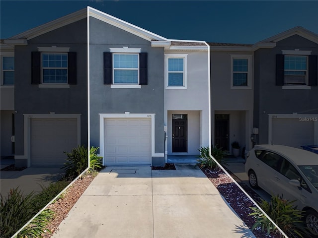 view of property with a garage