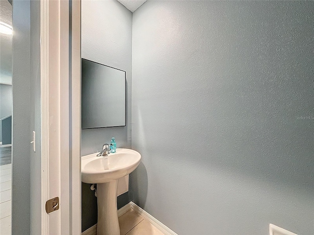 bathroom featuring tile patterned flooring