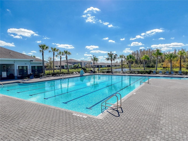 view of swimming pool with a patio area