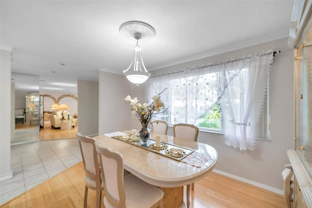 dining area featuring light wood-type flooring