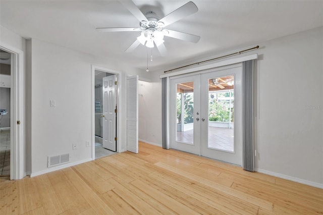 interior space featuring french doors, ceiling fan, and light wood-type flooring