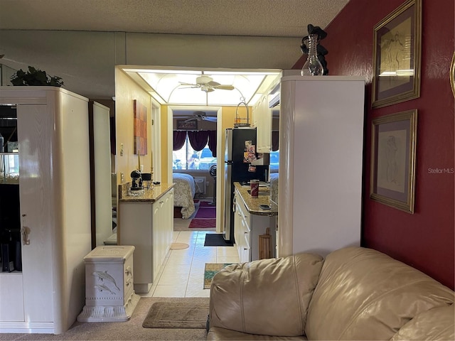 20857 Haulover Cv Unit B-13, Lutz, FL 33558 - hallway with light tile patterned flooring