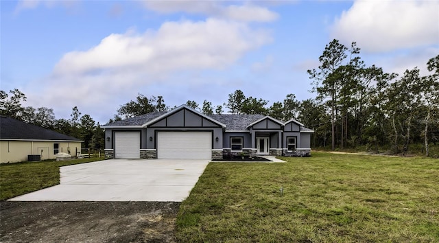 craftsman inspired home featuring a garage and a front yard