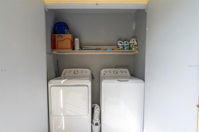 laundry room with washer and clothes dryer