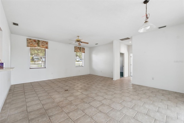 spare room with ceiling fan