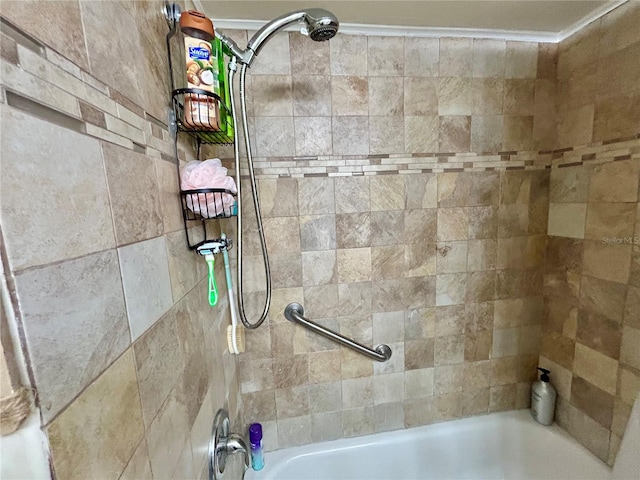 bathroom featuring tiled shower / bath combo