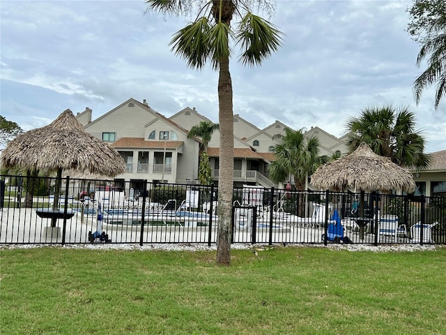 exterior space with a front lawn and a gazebo