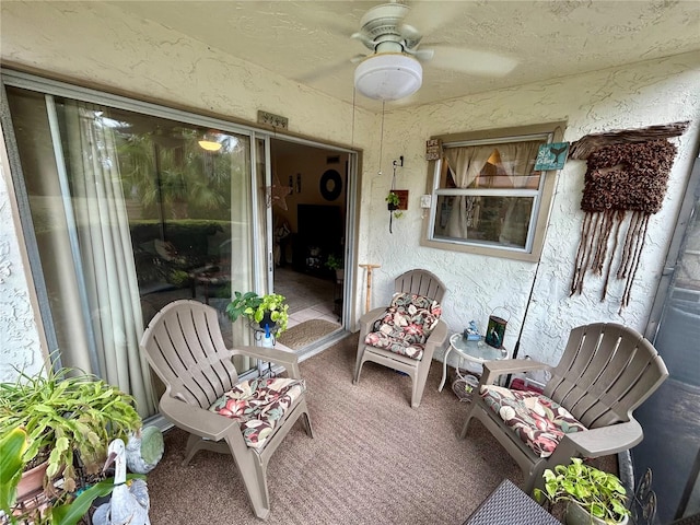 view of patio / terrace featuring ceiling fan